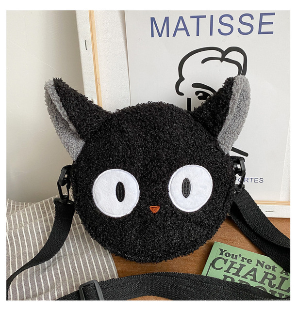 kikiページ Jiji-Crossbody-Mini-Bag.jpg